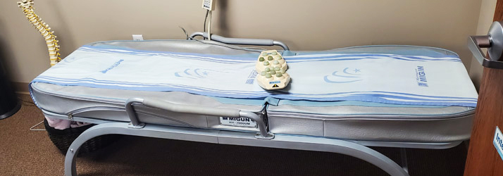 Migun thermal massage bed at Precision Spinal Care
